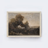 Cream coloured wood frame of a painting of a landscape with trees and a house on a white wall