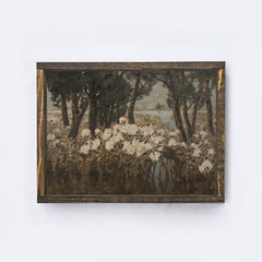 Framed artwork of a landscape with trees and flowers on a wooden shelf.
