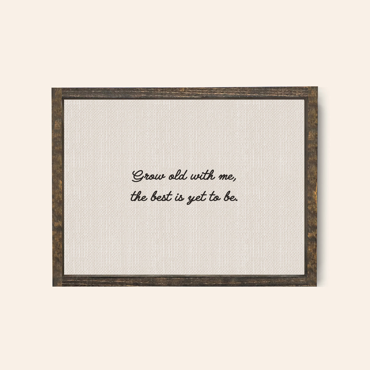 Espresso wood coloured frame with the text in a whimsical handwritten text "grow old with me the best is yet to be"