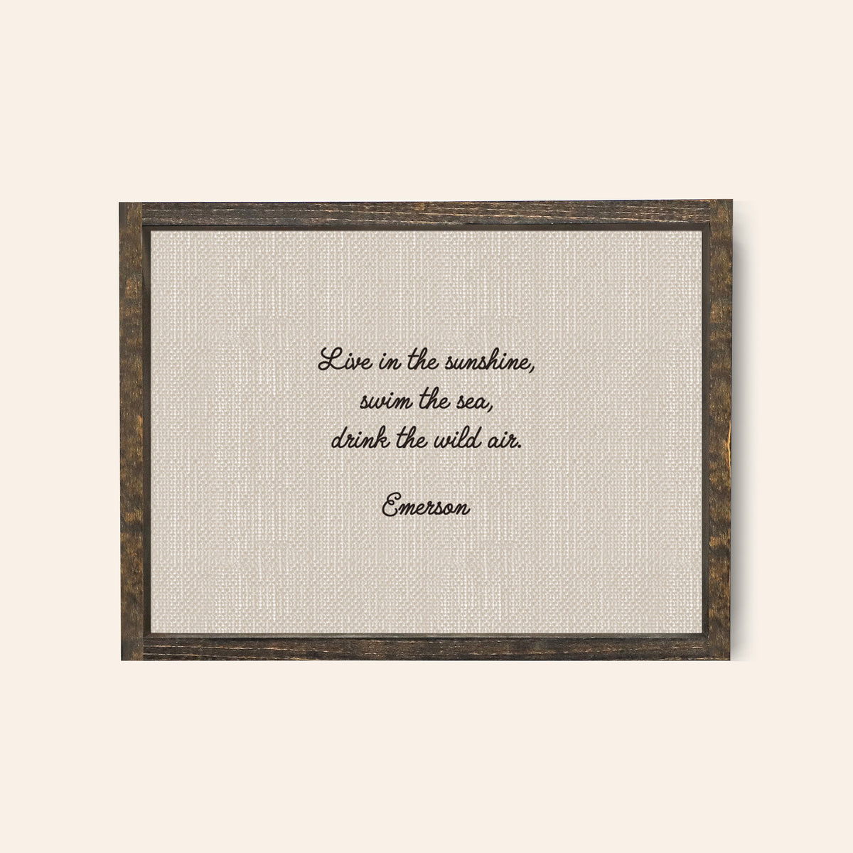 Espresso framed wood sign with the quote, "Live In The Sunshine, swim the sea, drink the wild air, emerson 