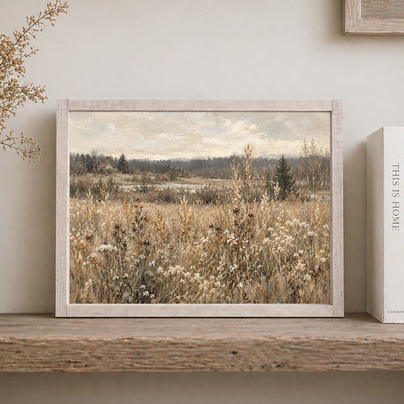 rustic white brown framed sign with a wildflower field painted in earthy tones sitting on a brown shelf