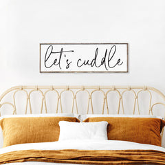 let's cuddle wood sign over the bed sign